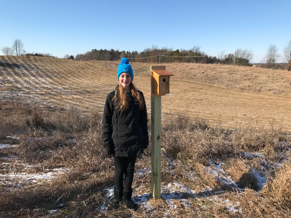 BSA Scout Jessica Witkowski in Hartland Park with bluebird houses